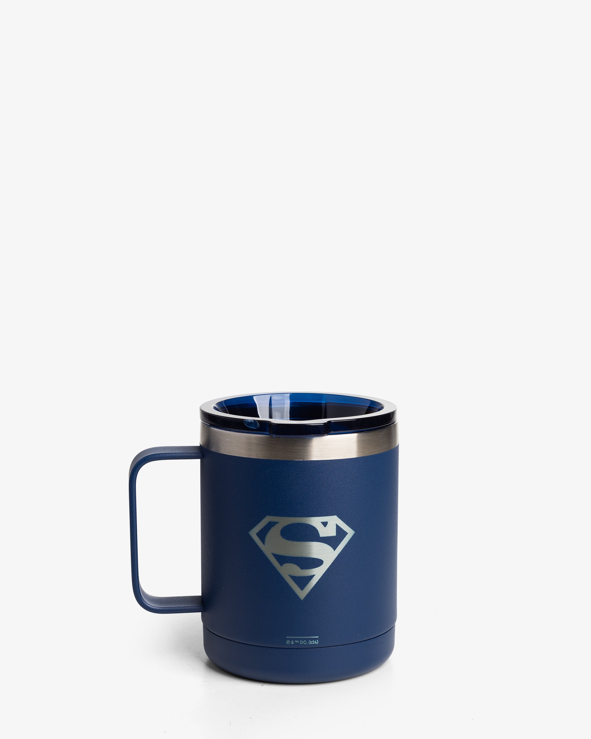 A blue insulated coffee mug with the Superman logo on it.