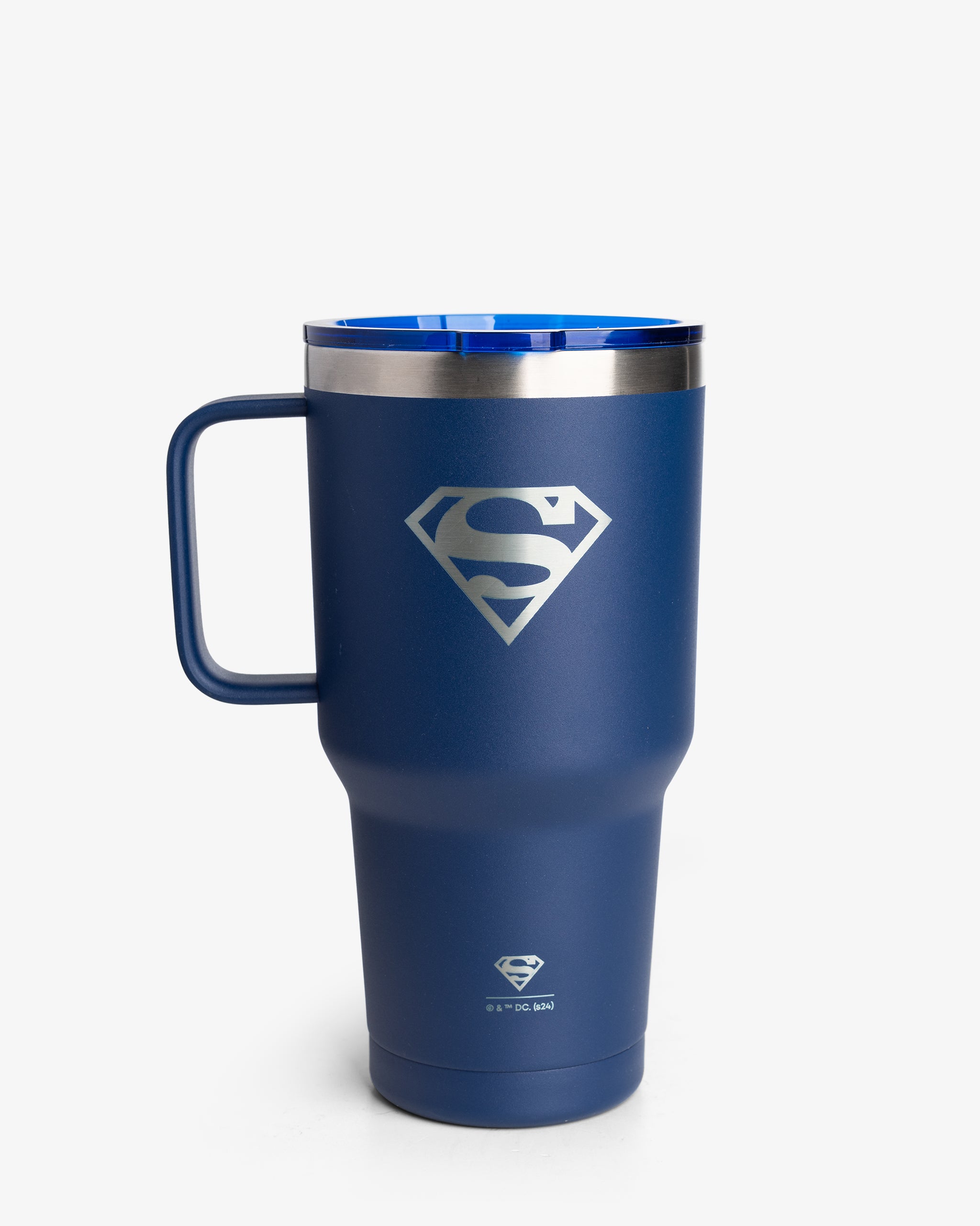 A blue insulated nomad tumbler with a flared design featuring the Superman logo.