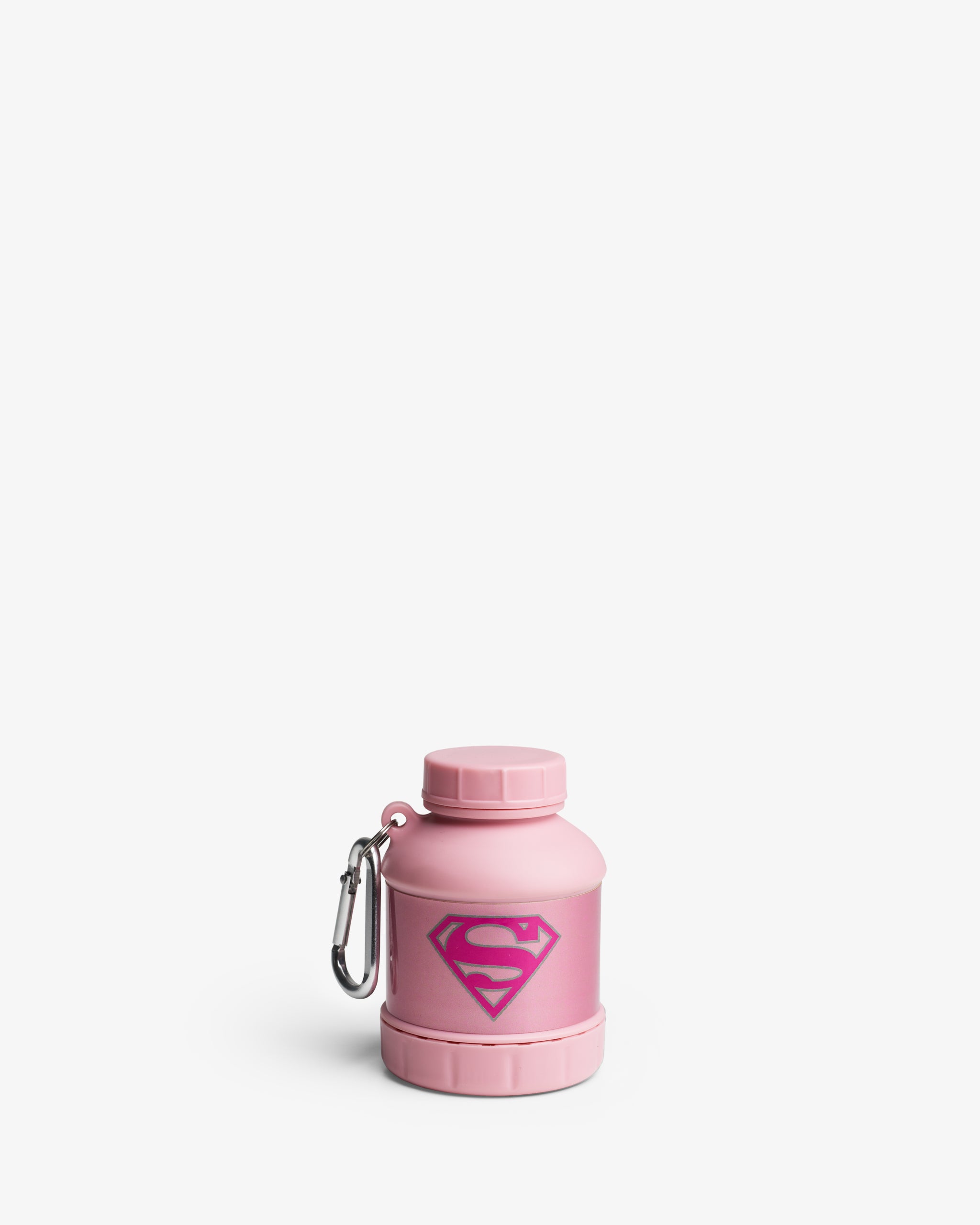 A pink portable supplement funnel with a Supergirl logo, equipped with a clip for attaching to a bag.